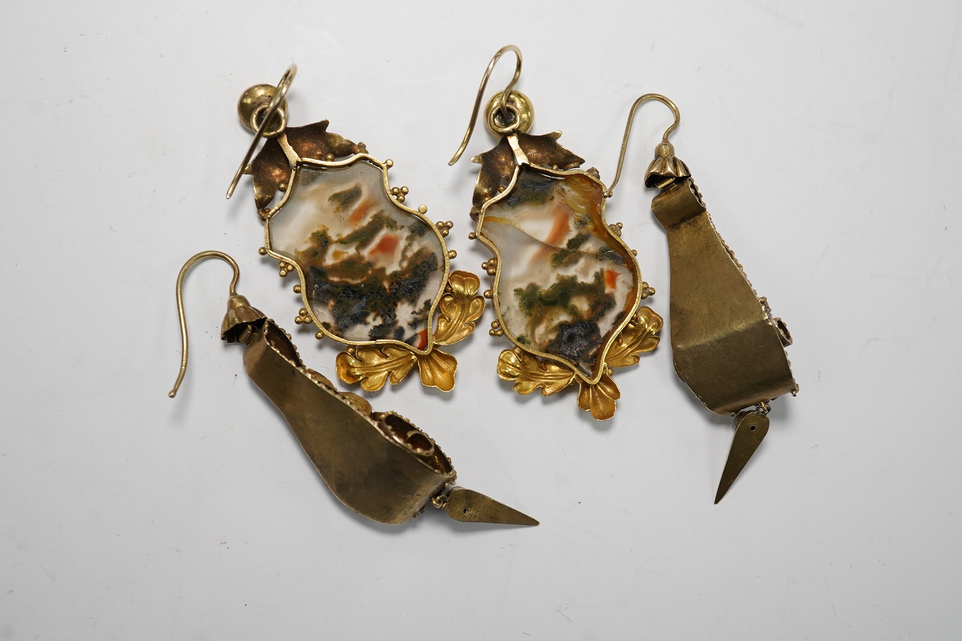 Two pairs of Victorian yellow metal earrings, one set with moss agate (a.f.) and one with citrine coloured stones, longest 50mm. Condition - poor to fair
